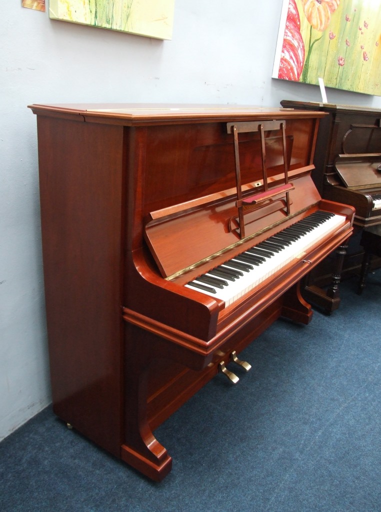 Grotrian Steinweg upright piano in mahogany lid open